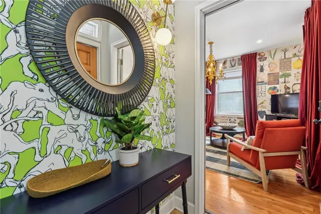 wooden floor with a table and a chair