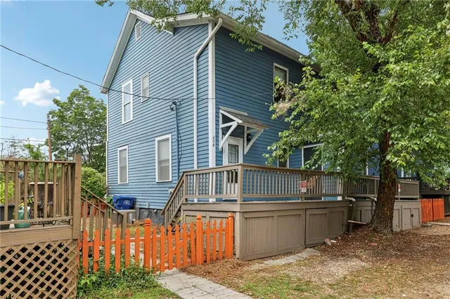 a front view of a house with a balcony