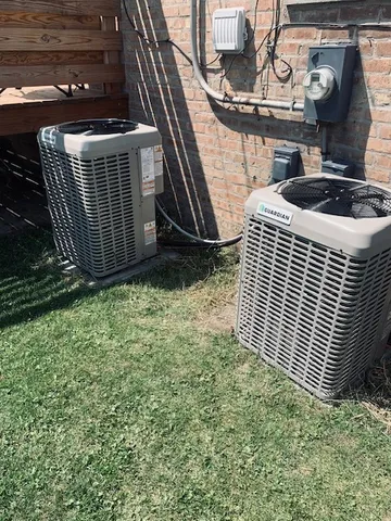 a view of barbecue grill and wooden fence