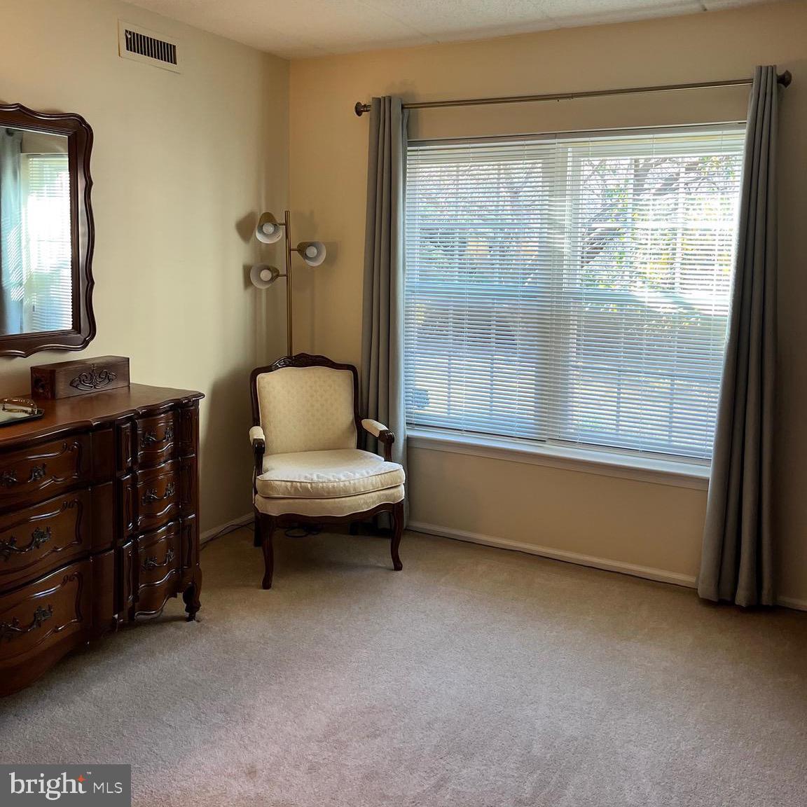 1815 Valley Glen Road, Unit 140 Elkins Park, PA 19027 - Photo 15 of 19 a living room with furniture and a window