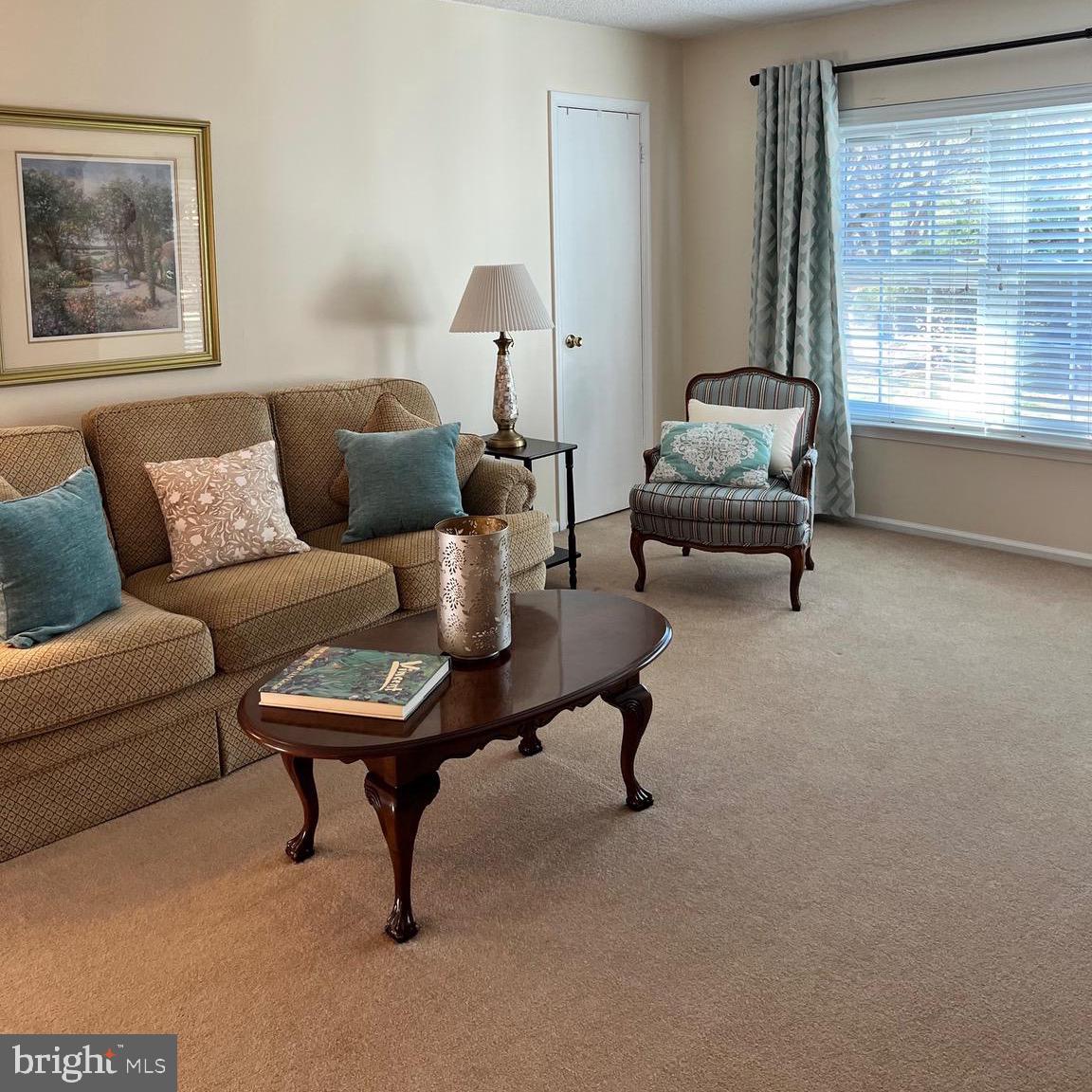 1815 Valley Glen Road, Unit 140 Elkins Park, PA 19027 - Photo 7 of 19 a living room with furniture and a window