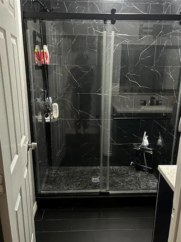 a bathroom with a mirror
