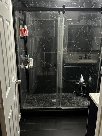 a bathroom with a mirror