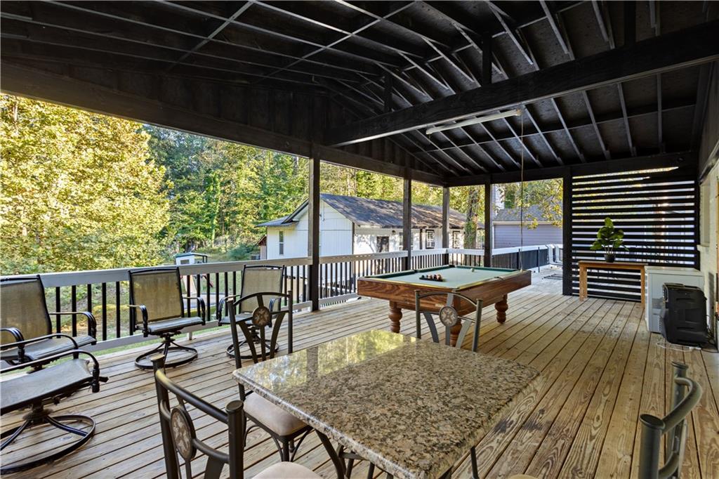 154 Dollar Mill Road Southwest Atlanta, GA 30331 - Photo 29 of 42 a backyard of a house with wooden floor outdoor seating and yard