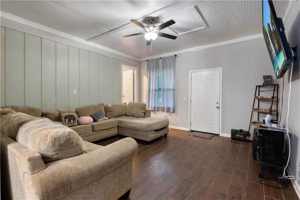 154 Dollar Mill Road Southwest Atlanta, GA 30331 - Photo 33 of 42 a living room with furniture and wooden floor