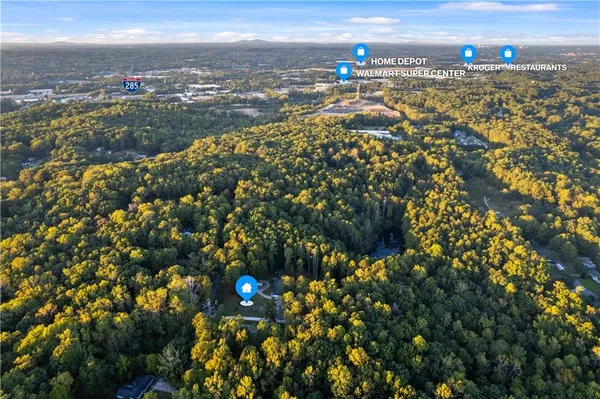 a view of city and green space