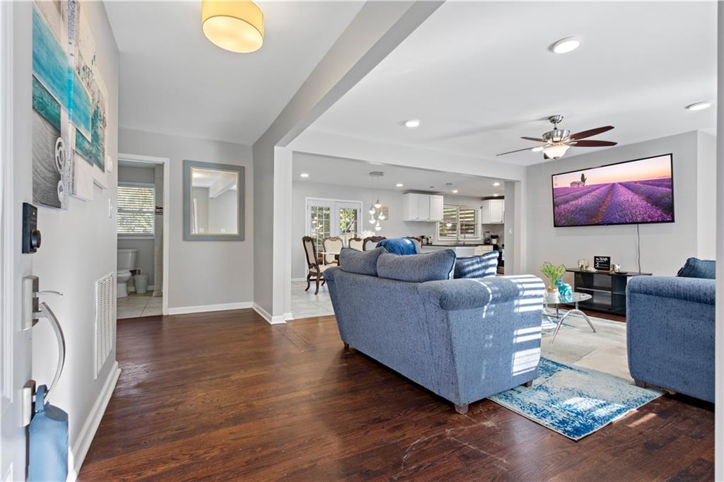 154 Dollar Mill Road Southwest Atlanta, GA 30331 - Photo 5 of 42 a living room with furniture and a flat screen tv