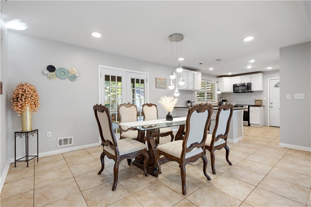 154 Dollar Mill Road Southwest Atlanta, GA 30331 - Photo 7 of 42 a view of a dining area with furniture