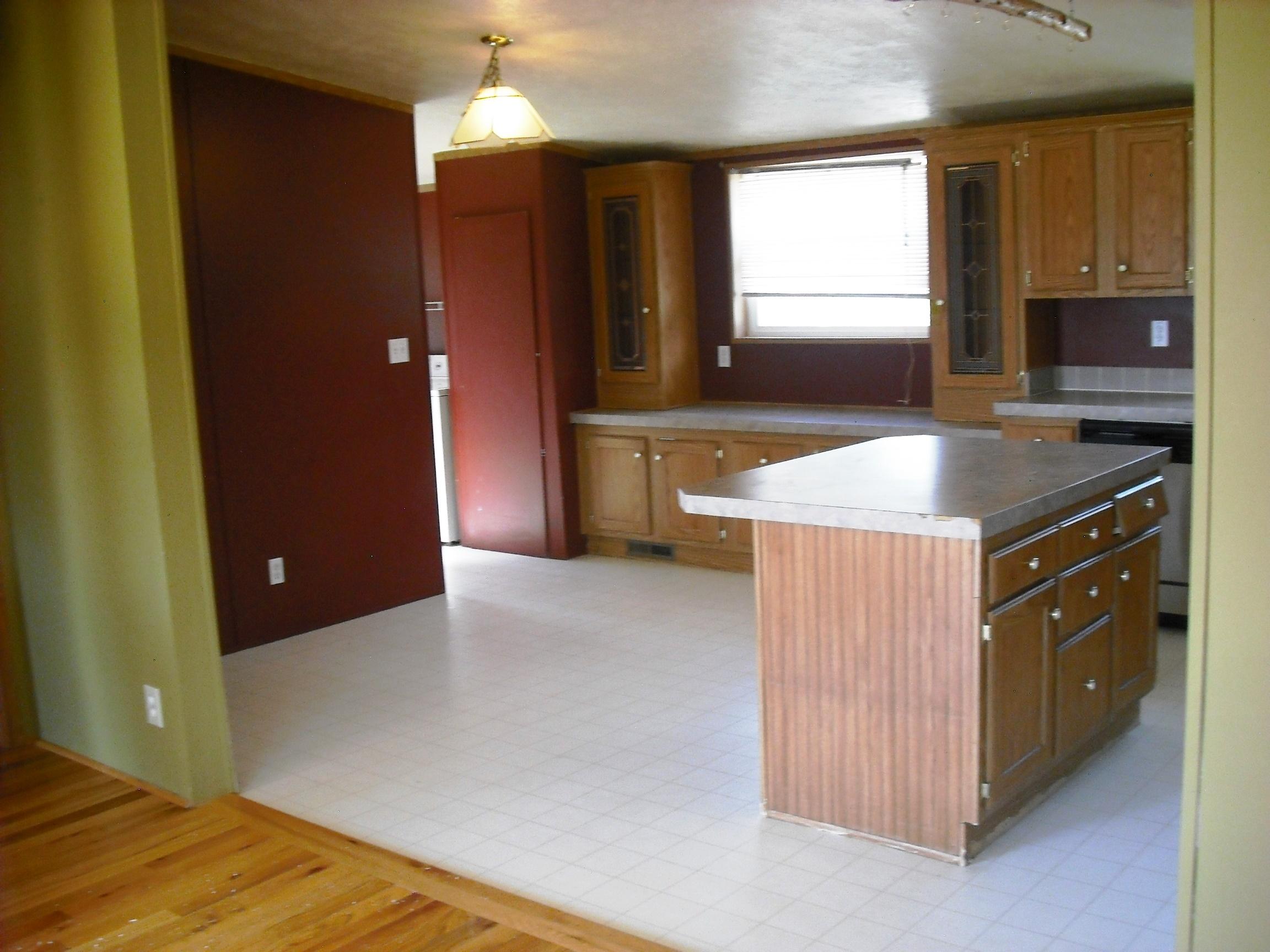 504 Ragsdale Road Norwood, CO 81423 - Photo 11 of 17 a kitchen with stainless steel appliances granite countertop a sink stove and refrigerator
