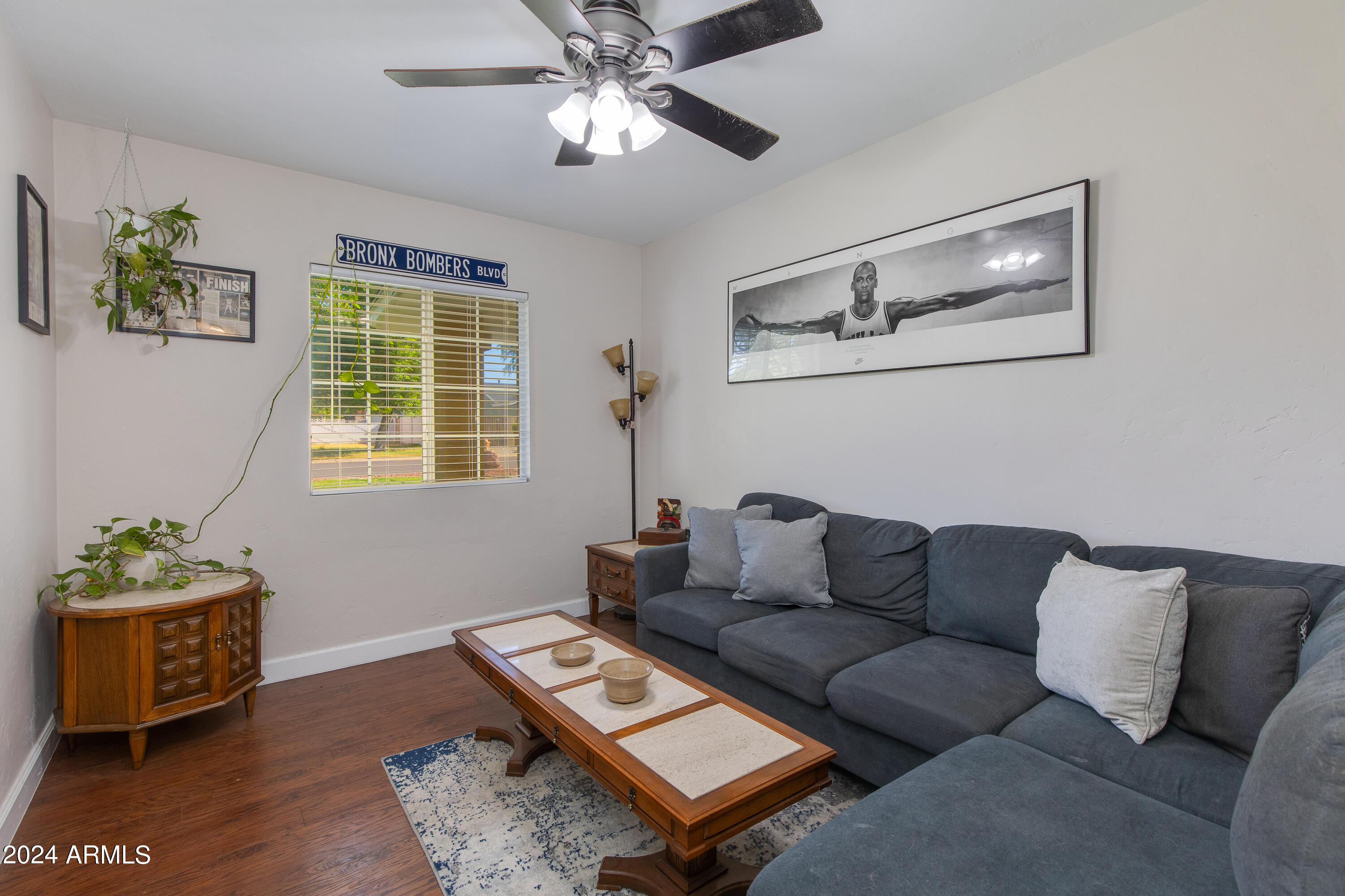 3041 East Roma Avenue Phoenix, AZ 85018 - Photo 12 of 14 a living room with furniture and a window