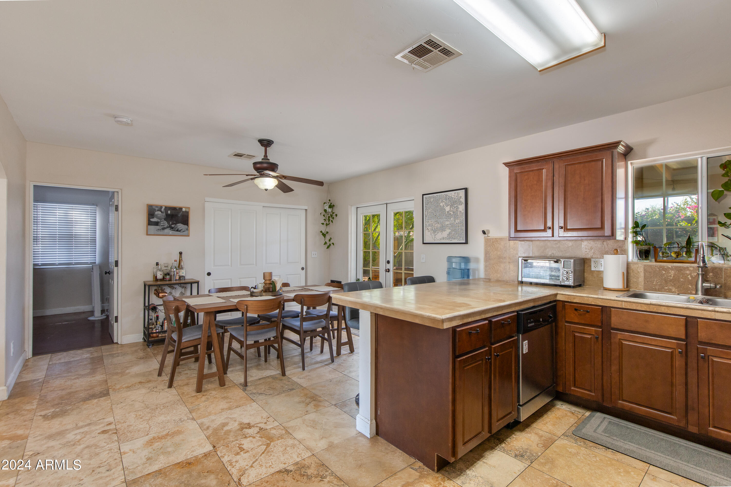 3041 East Roma Avenue Phoenix, AZ 85018 - Photo 6 of 14 a kitchen with lots of counter top space