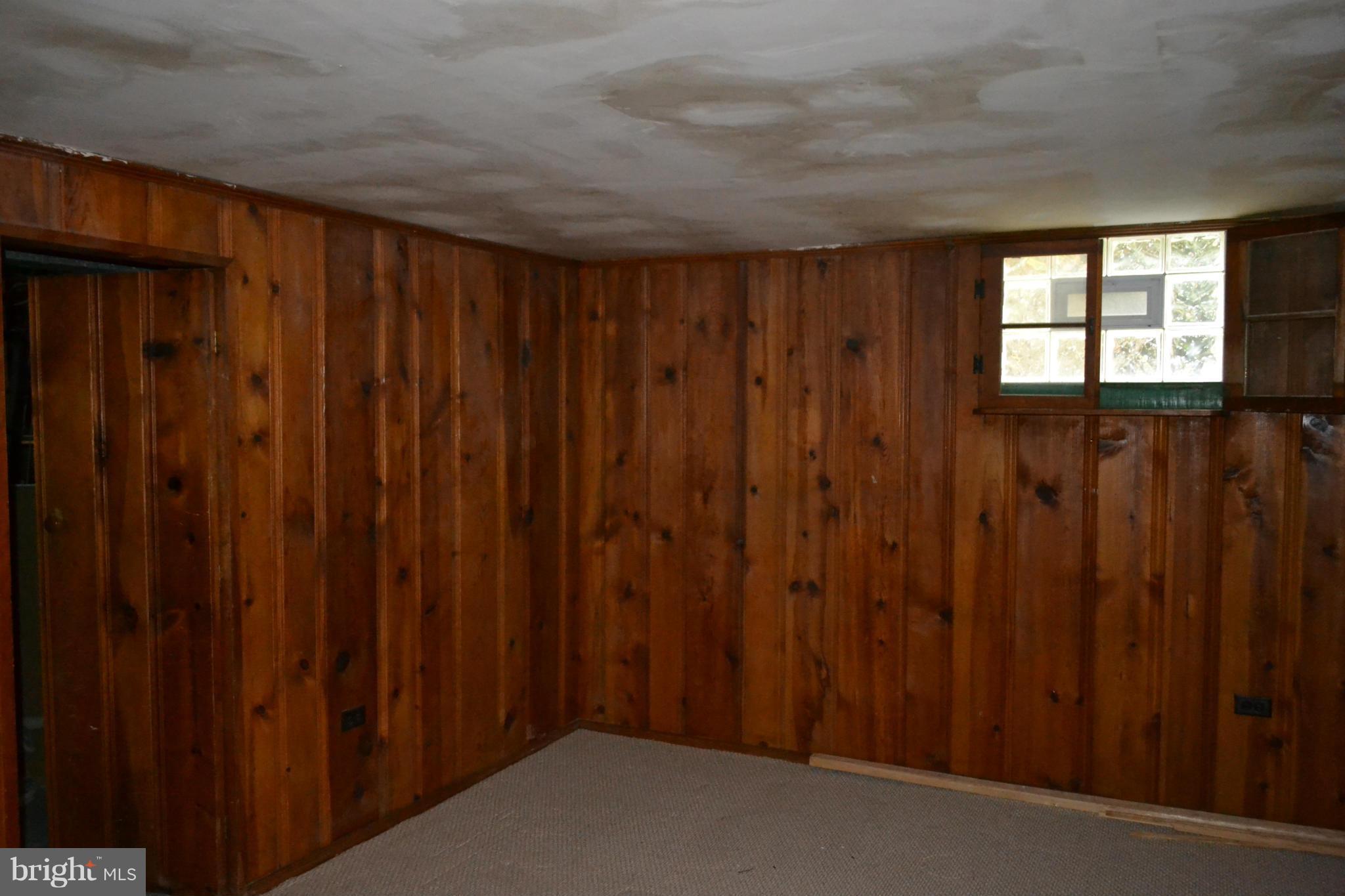 842 Bradhurst Road Baltimore, MD 21212 - Photo 13 of 28 a view of a room with wooden walls
