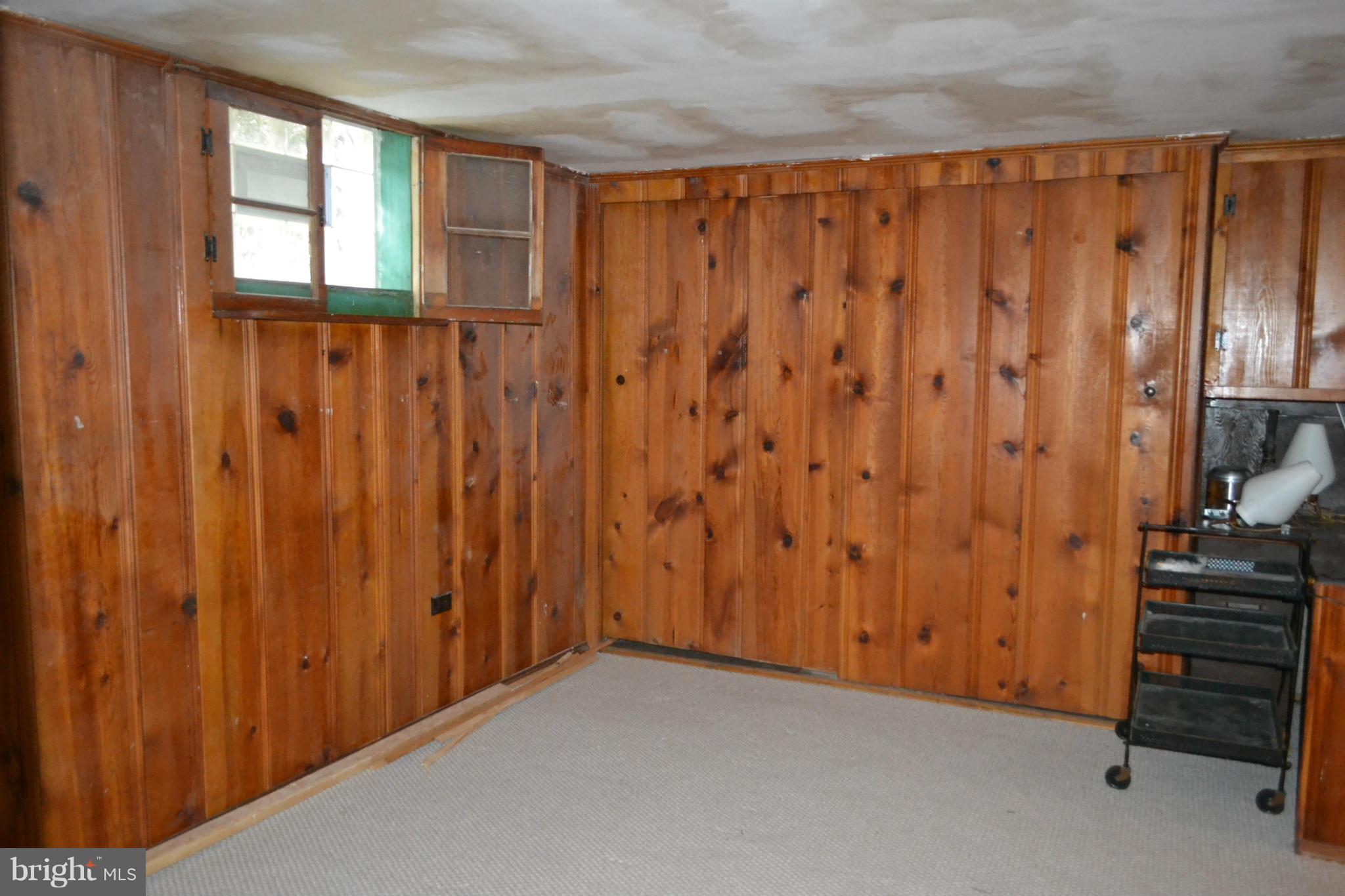 842 Bradhurst Road Baltimore, MD 21212 - Photo 14 of 28 a view of a room with a wooden door