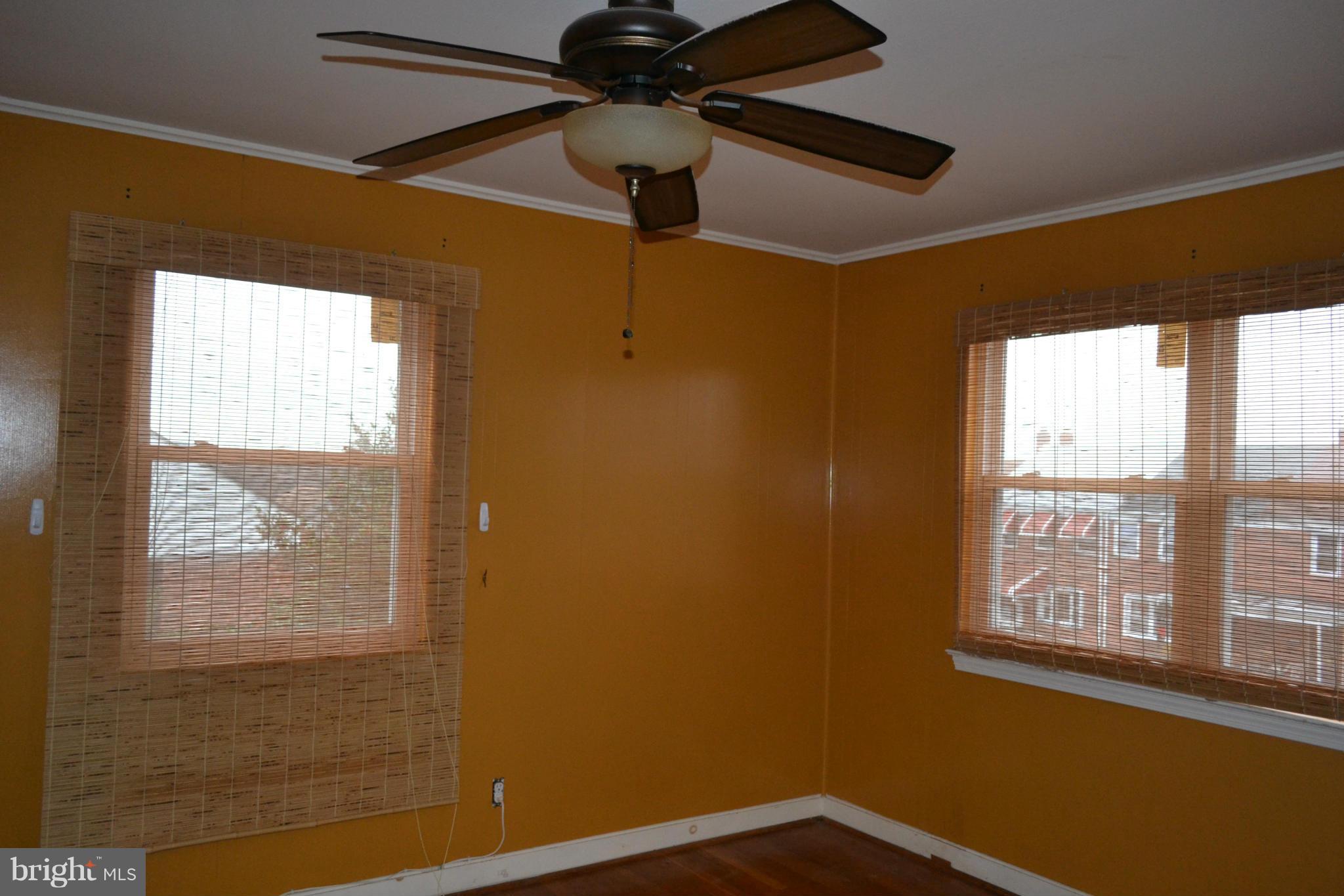 842 Bradhurst Road Baltimore, MD 21212 - Photo 17 of 28 a view of empty room with windows
