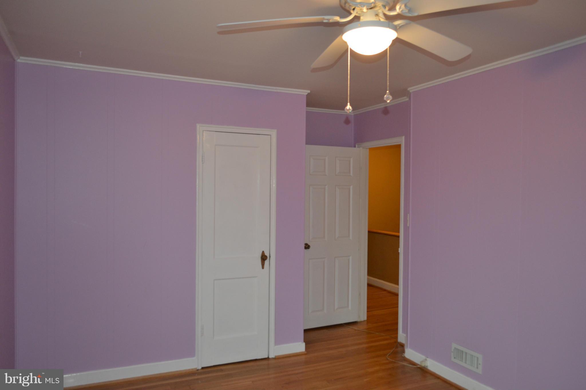 842 Bradhurst Road Baltimore, MD 21212 - Photo 3 of 28 a view of a livingroom with wooden floor