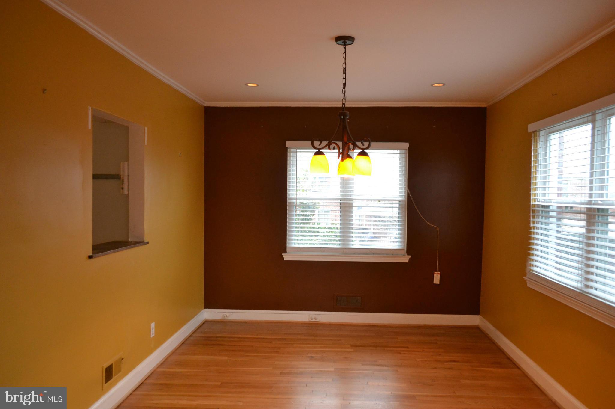 842 Bradhurst Road Baltimore, MD 21212 - Photo 8 of 28 a view of an empty room with a window