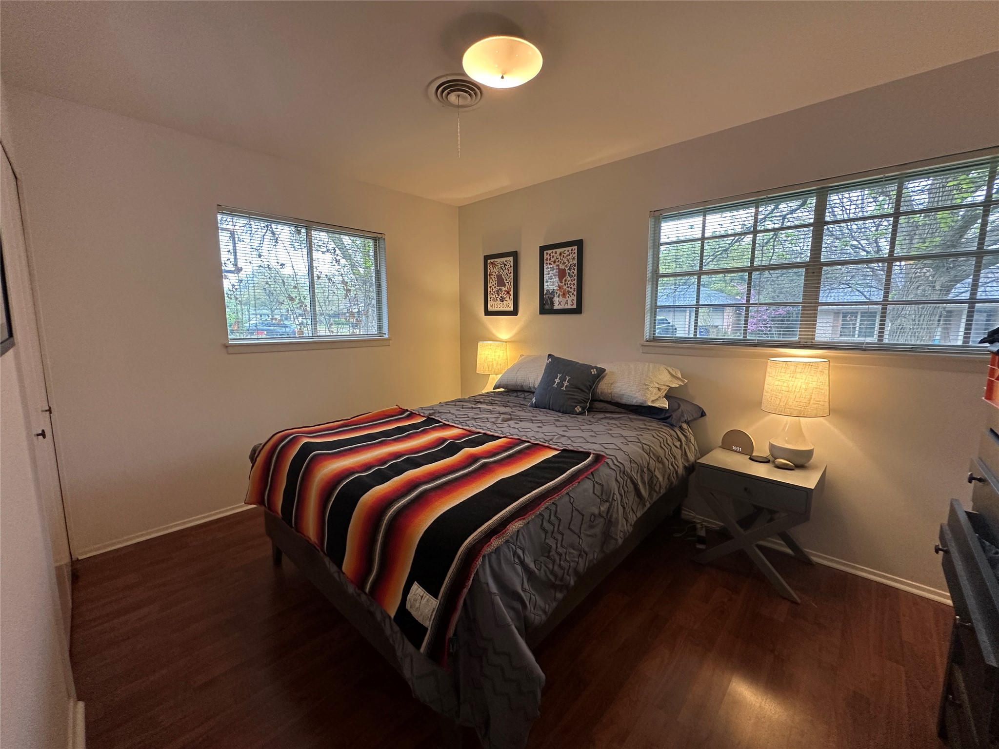 1908 Pompton Drive Austin, TX 78757 - Photo 13 of 22 a bedroom with a bed and a window