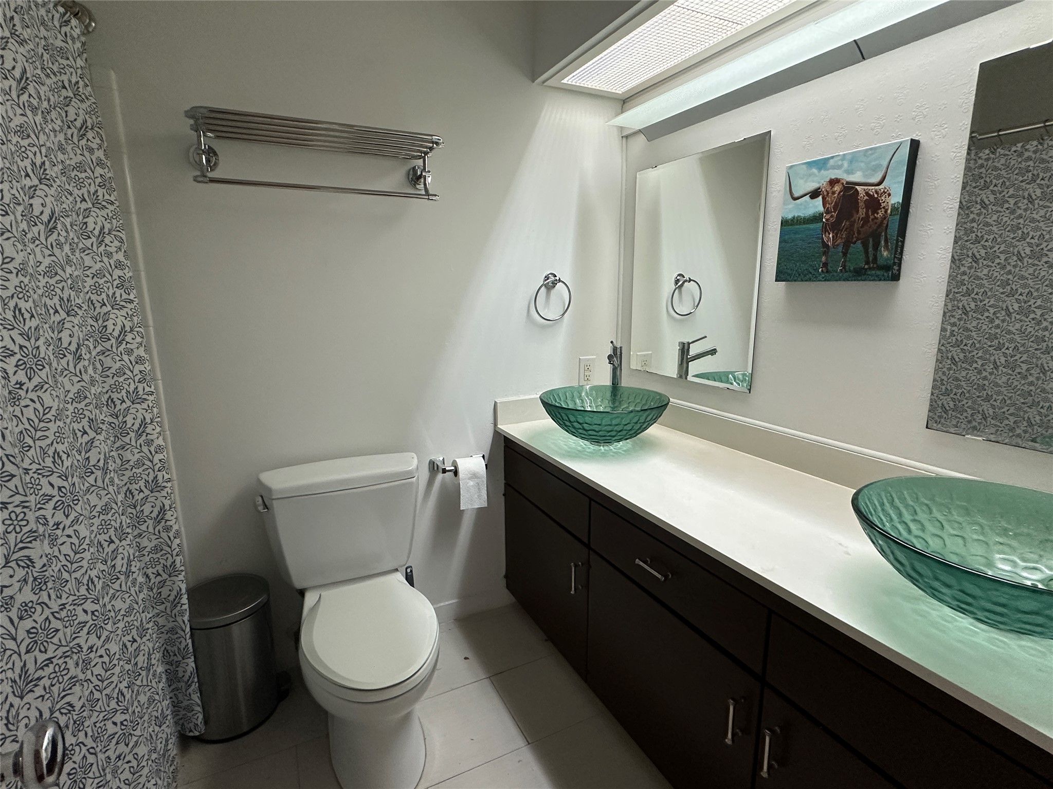 1908 Pompton Drive Austin, TX 78757 - Photo 16 of 22 a bathroom with a granite countertop toilet sink and mirror