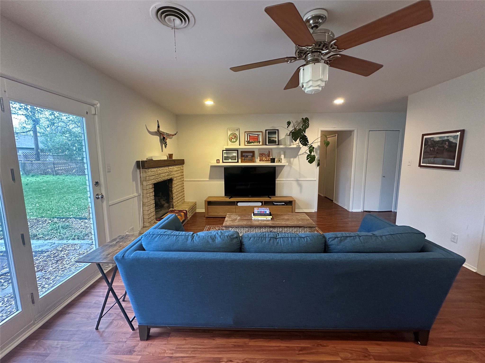 1908 Pompton Drive Austin, TX 78757 - Photo 3 of 22 a living room with furniture and a fireplace