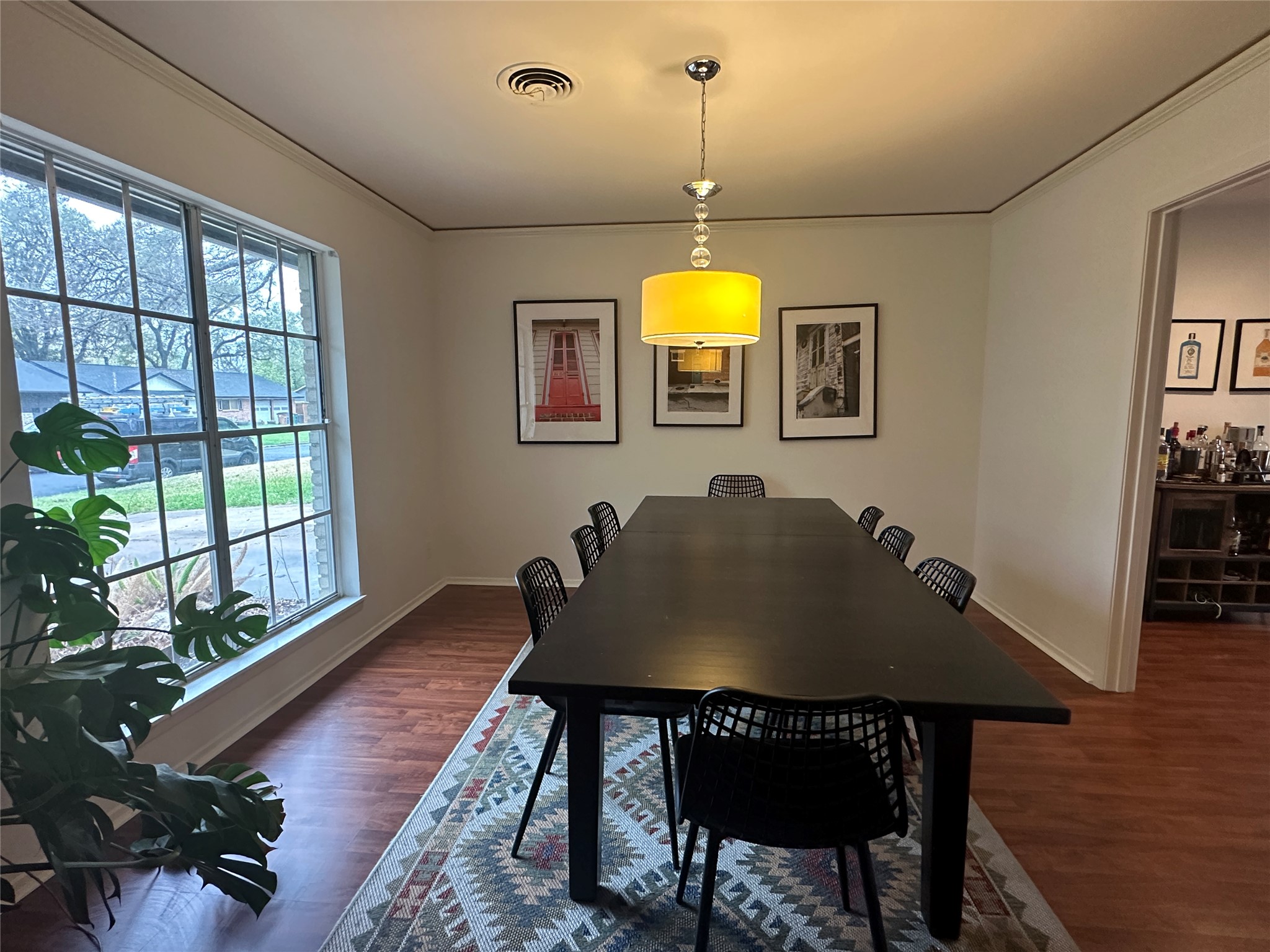 1908 Pompton Drive Austin, TX 78757 - Photo 6 of 22 a view of a dining room with furniture and wooden floor