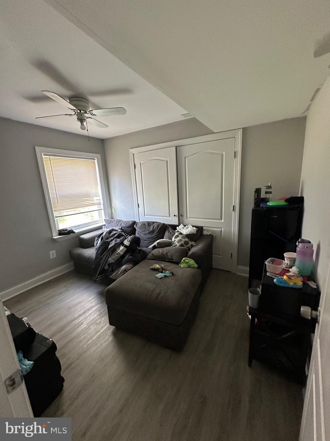 308 Sollers Point Road Dundalk, MD 21222 - Photo 19 of 22 a living room with furniture and a window