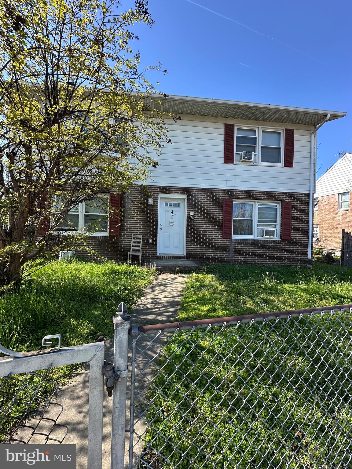 308 Sollers Point Road Dundalk, MD 21222 - Photo 2 of 22 a brick house with a large windows