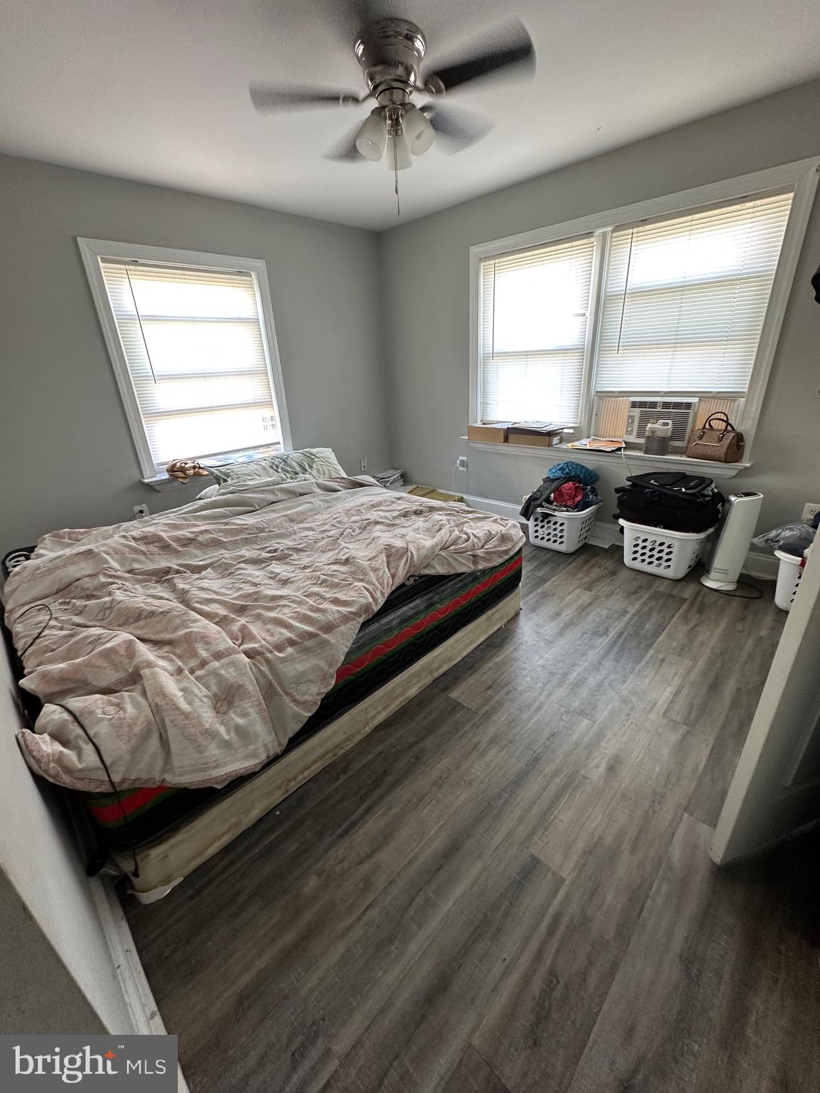308 Sollers Point Road Dundalk, MD 21222 - Photo 21 of 22 a bed sitting in a bedroom next to a window