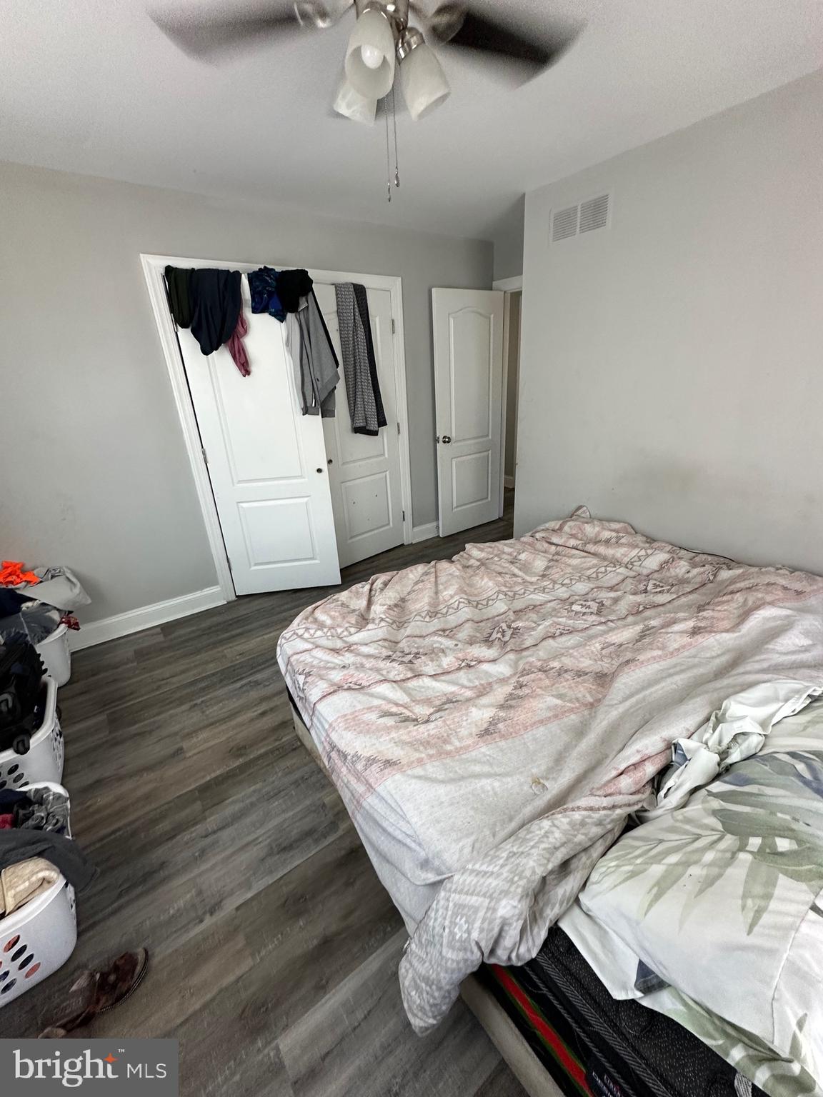 308 Sollers Point Road Dundalk, MD 21222 - Photo 22 of 22 a bed sitting in a bedroom next to a bathroom