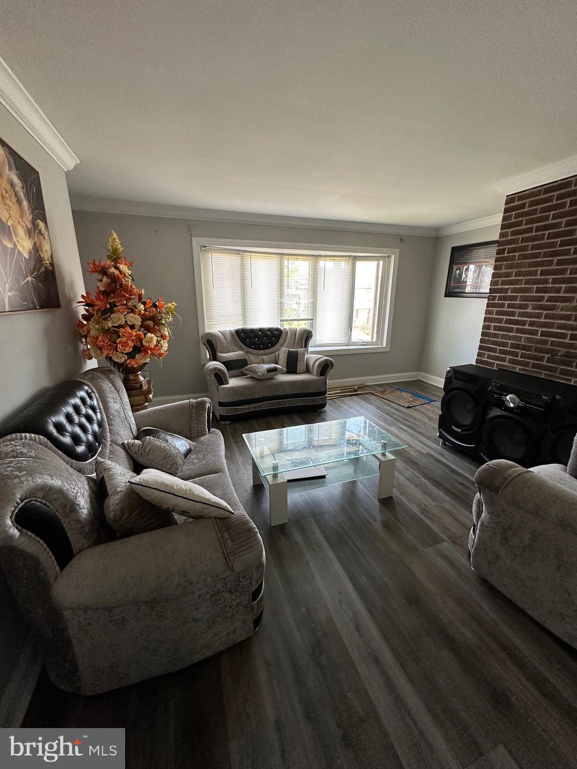308 Sollers Point Road Dundalk, MD 21222 - Photo 3 of 22 a living room with furniture and a window