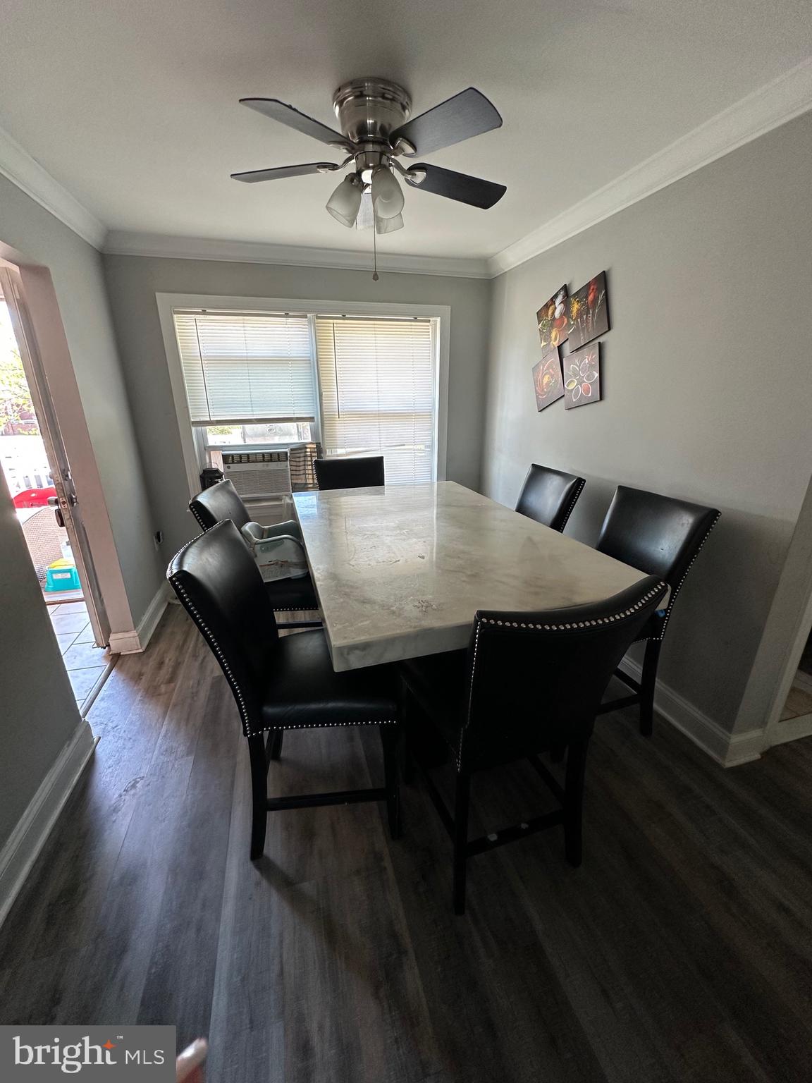 308 Sollers Point Road Dundalk, MD 21222 - Photo 9 of 22 a view of a dining room with furniture window and wooden floor
