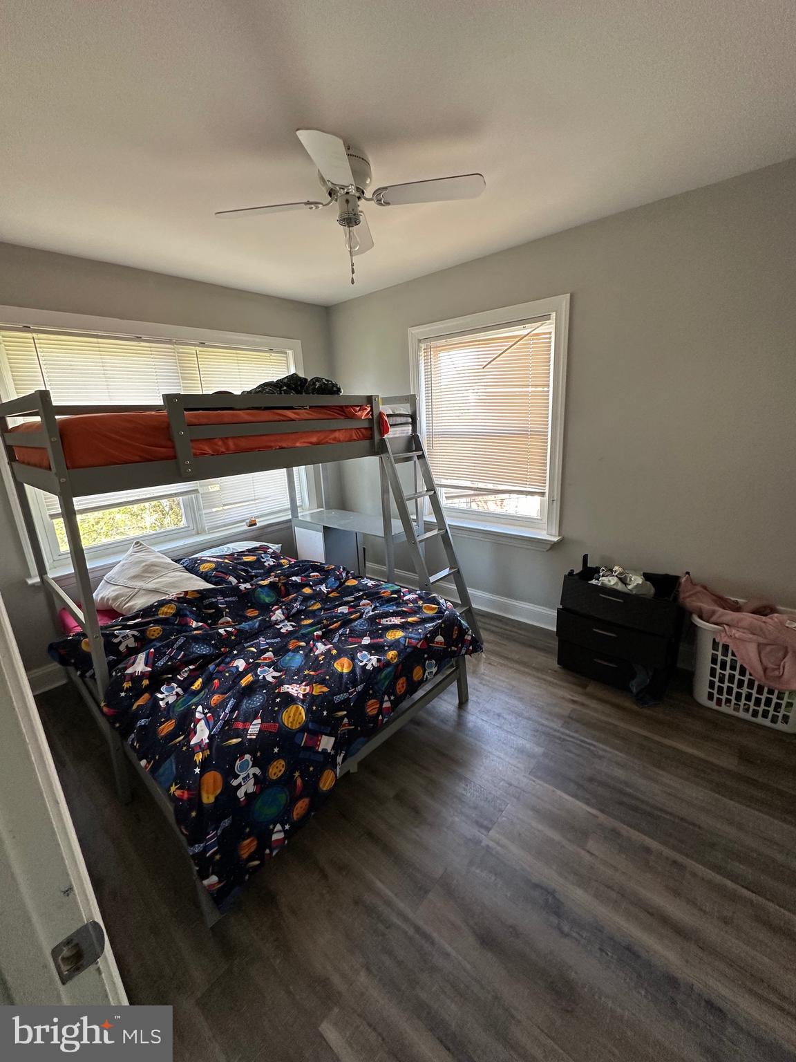 308 Sollers Point Road Dundalk, MD 21222 - Photo 10 of 22 a bed sitting in a bedroom next to a window