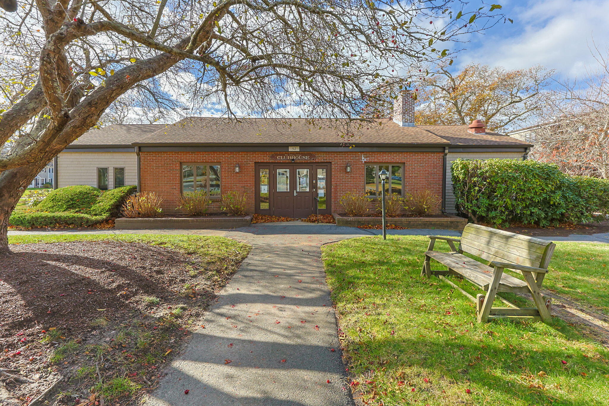 42 Old Colony Way, Unit 28 Orleans, MA 02653 - Photo 22 of 31 front view of a house with a yard