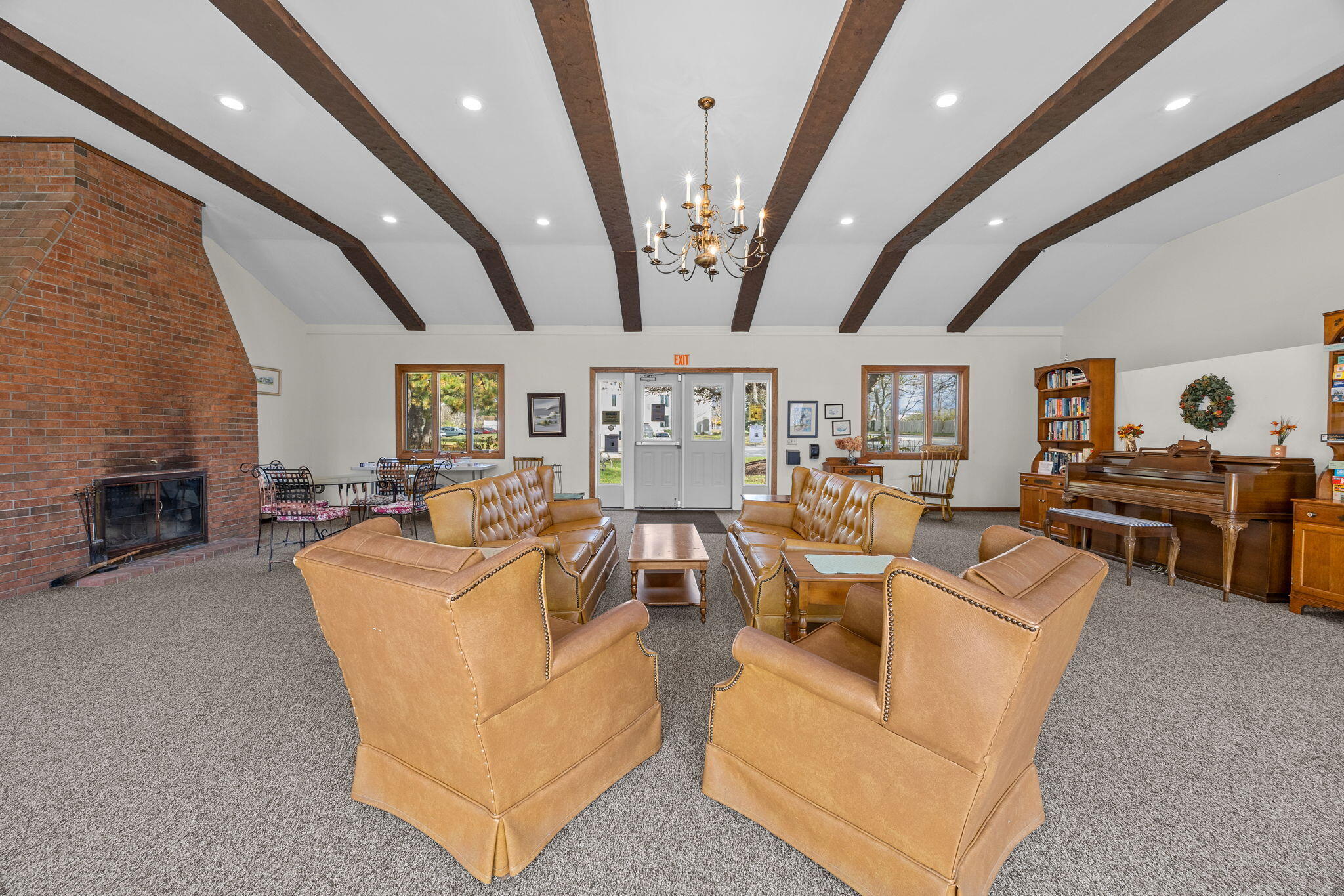 42 Old Colony Way, Unit 28 Orleans, MA 02653 - Photo 27 of 31 a living room with furniture and fireplace
