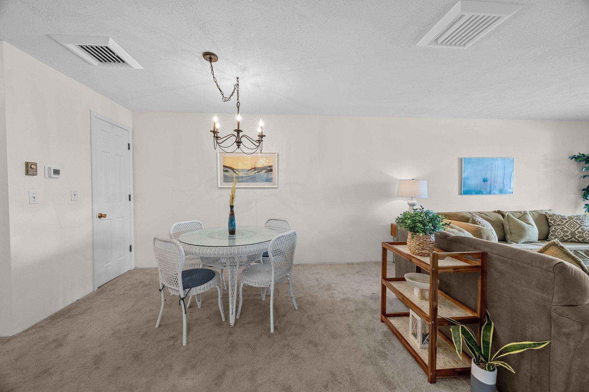 42 Old Colony Way, Unit 28 Orleans, MA 02653 - Photo 7 of 31 a view of a dining room with furniture window and outside view