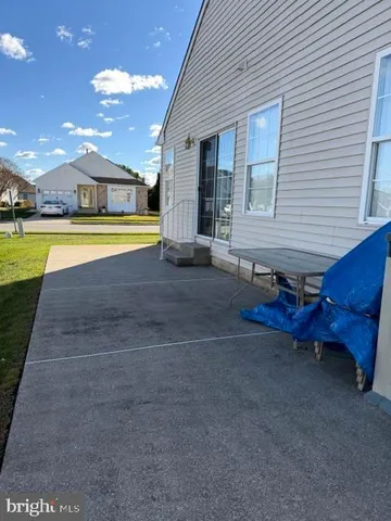 a view of a house with a swimming pool
