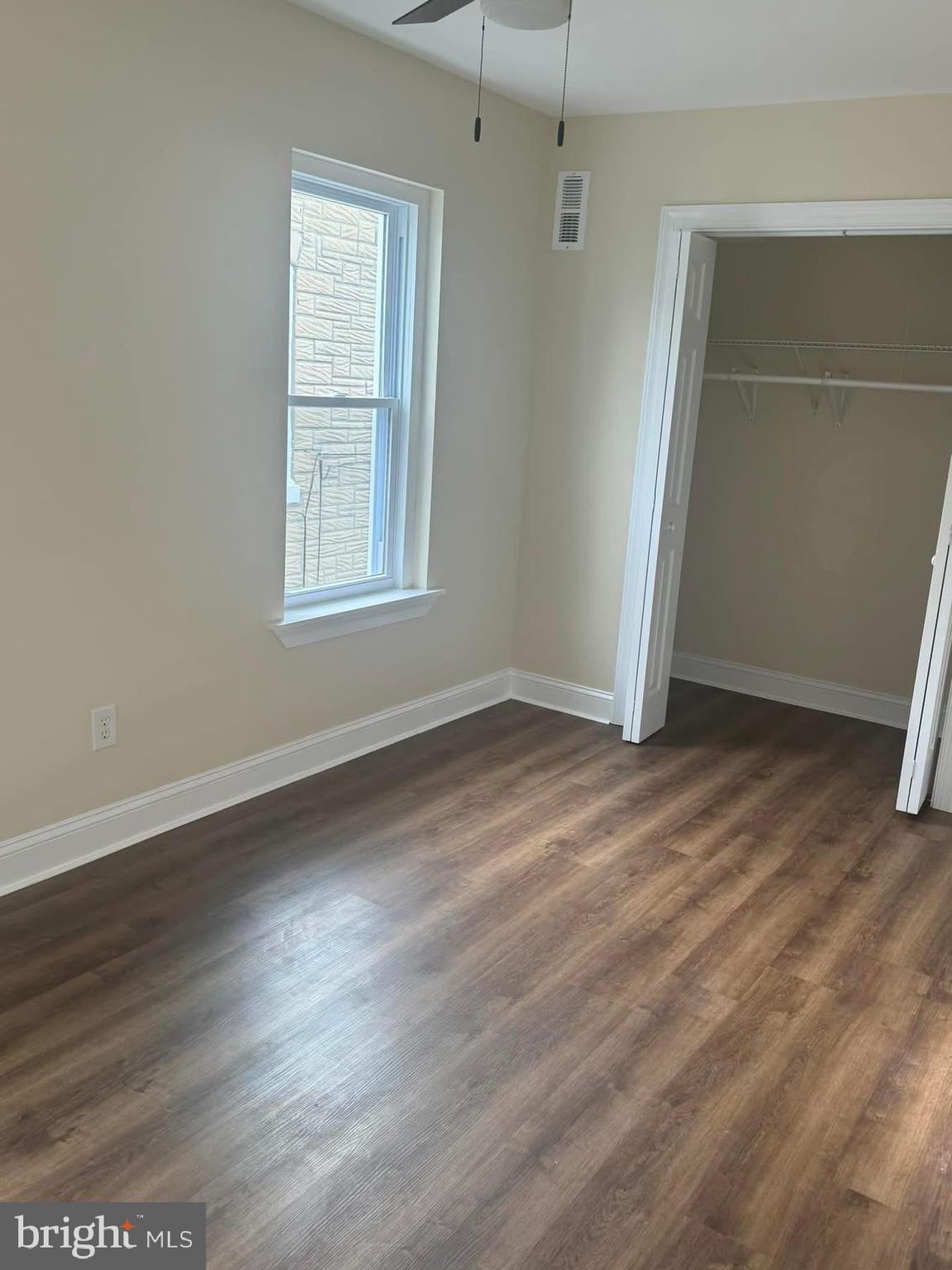 15 Sacco Road Royersford, PA 19468 - Photo 6 of 13 an empty room with wooden floor and windows
