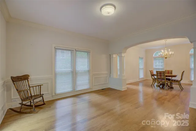 a kitchen that has a sink a stove and stainless steel appliances
