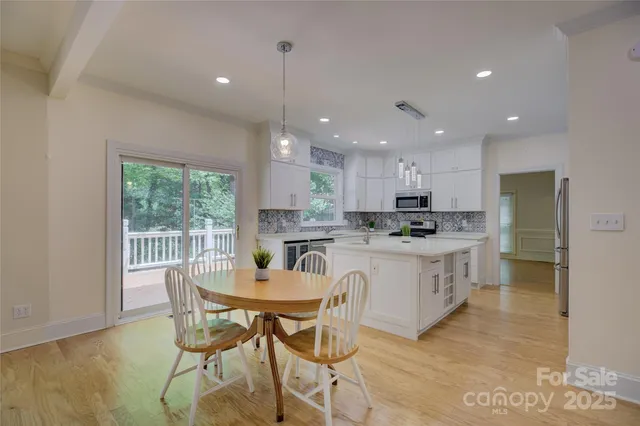 wooden floor in an empty room with a fireplace