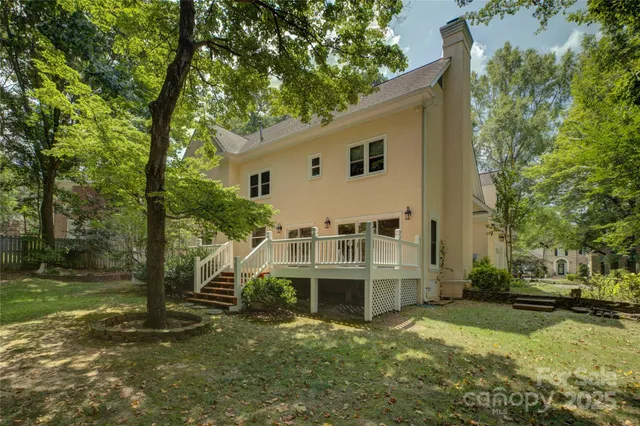 a view of a yard with a tree