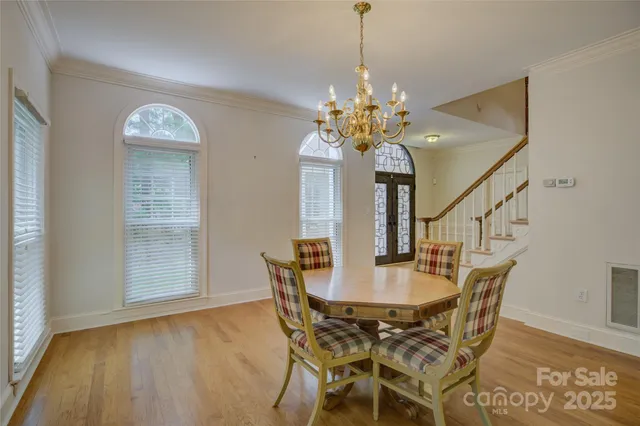 a view of a livingroom with furniture and wooden floor