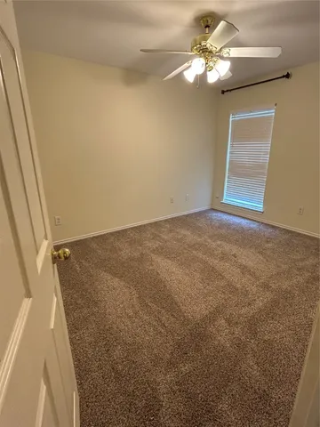 a view of a livingroom with a fan