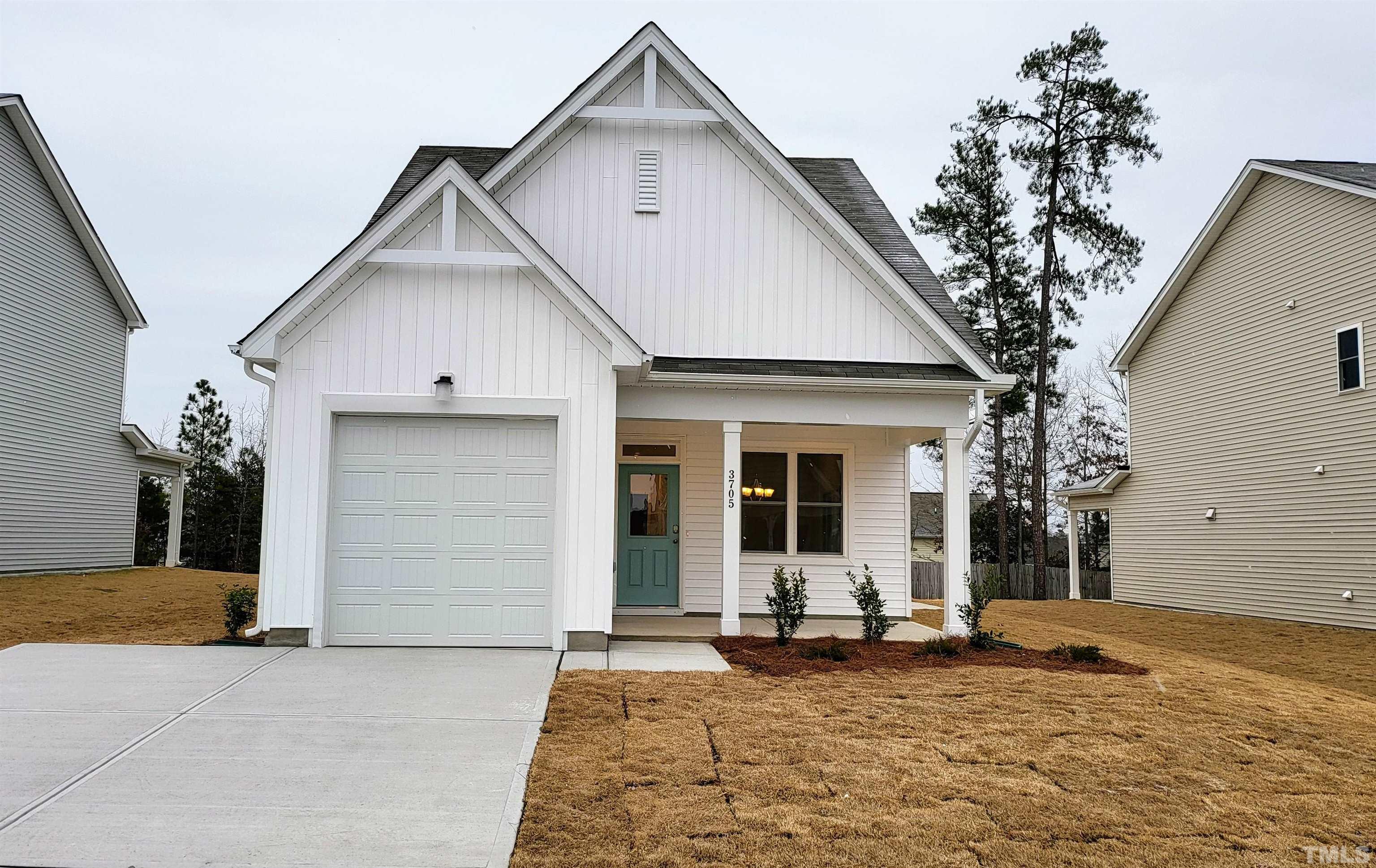 3705 Stark Road Raleigh, NC 27610 - Photo 2 of 2 a view of a house with backyard