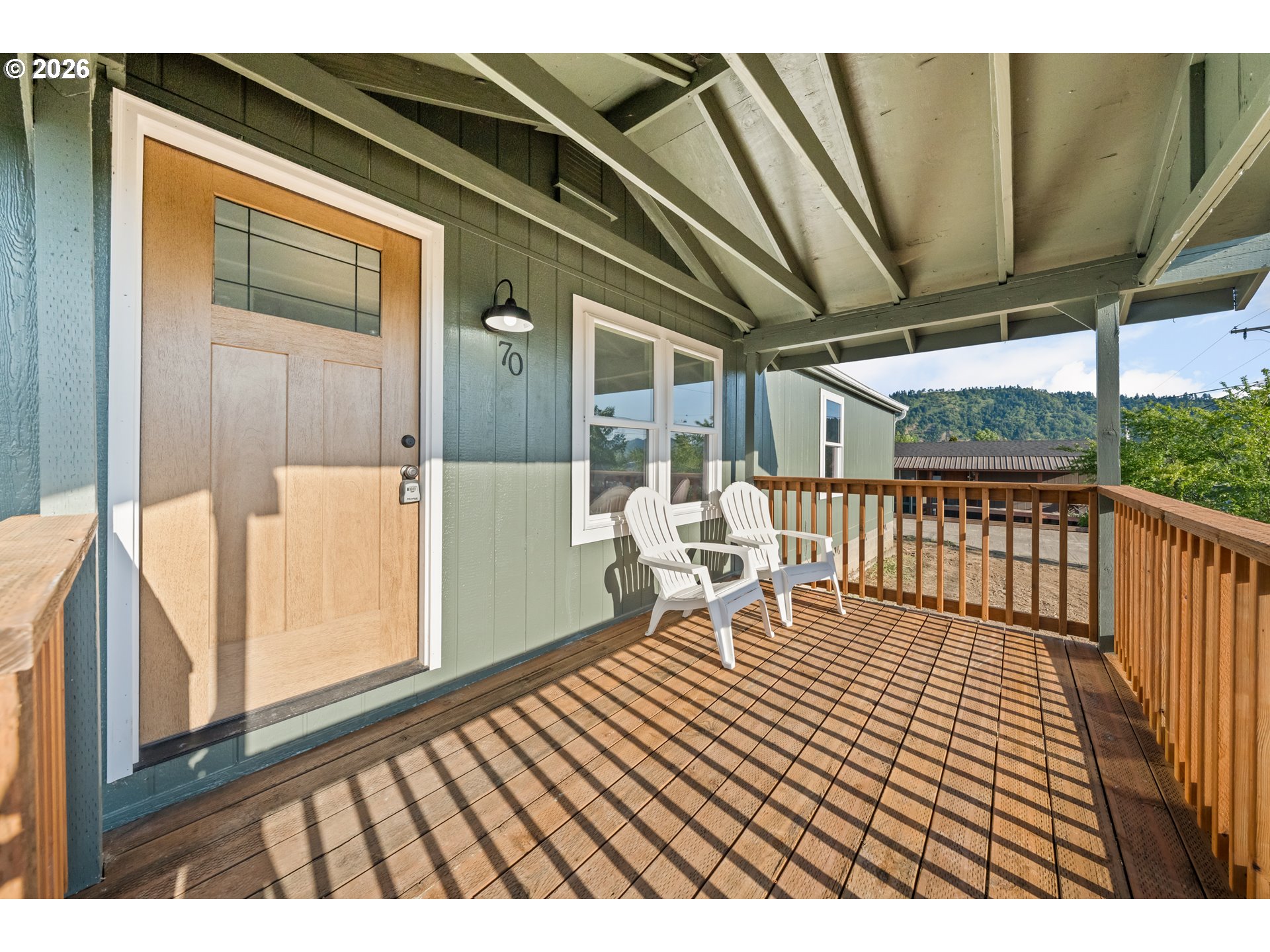 70 Darrell Avenue Winston, OR 97496 - Photo 3 of 39 a balcony with wooden floor