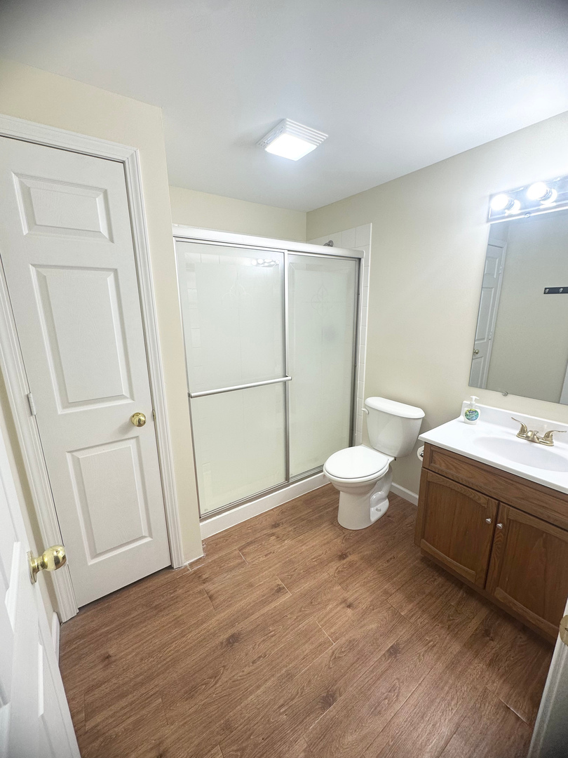 1151 Mary Court DeKalb, IL 60115 - Photo 13 of 20 a bathroom with a sink toilet and a mirror