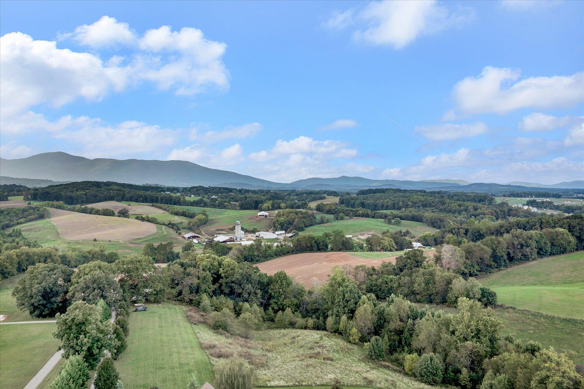 2220 Callaway Road Rocky Mount, VA 24151 - Photo 2 of 22 an aerial view of city and lake