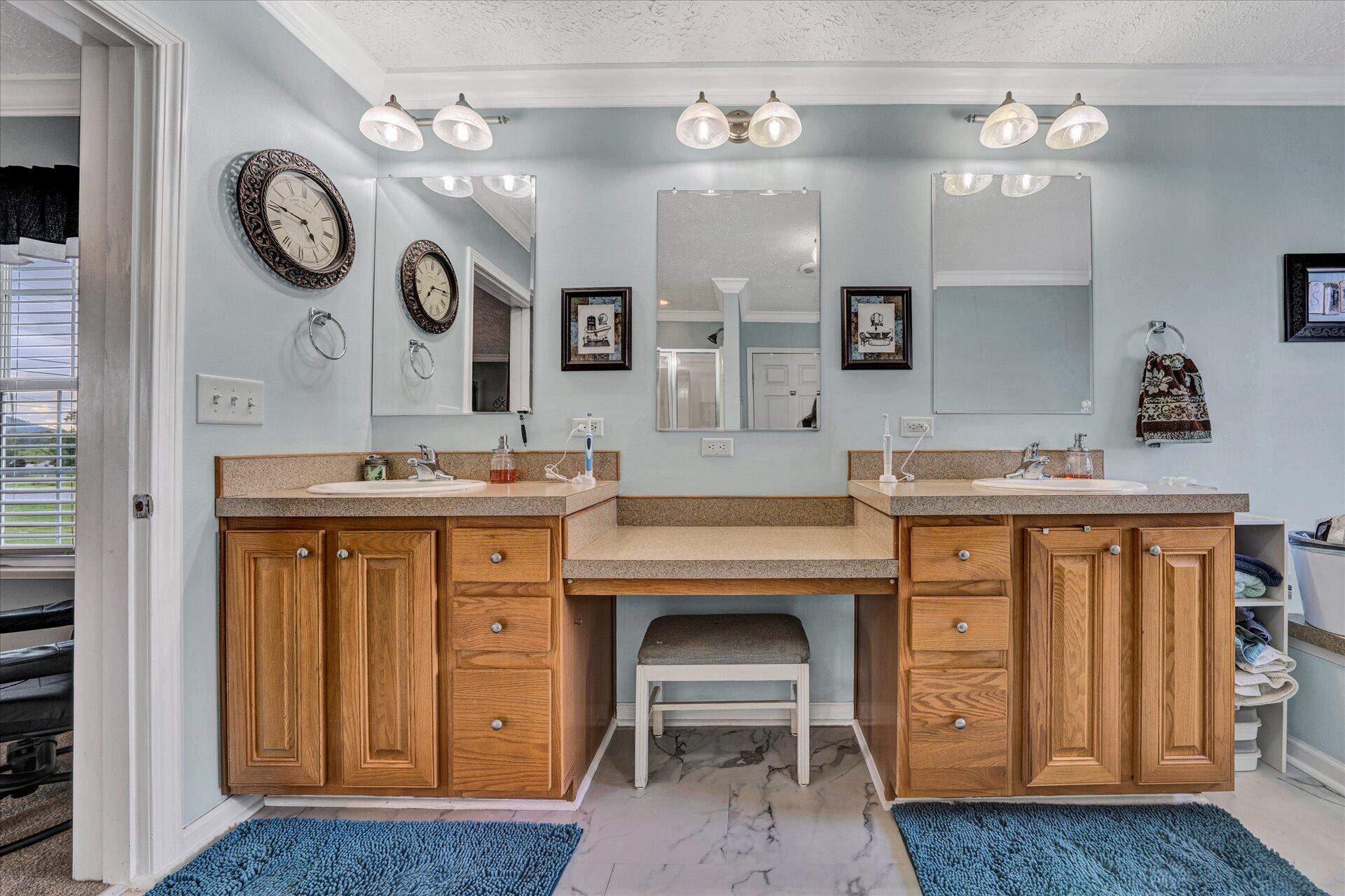 2220 Callaway Road Rocky Mount, VA 24151 - Photo 14 of 22 a bathroom with a sink and a mirror