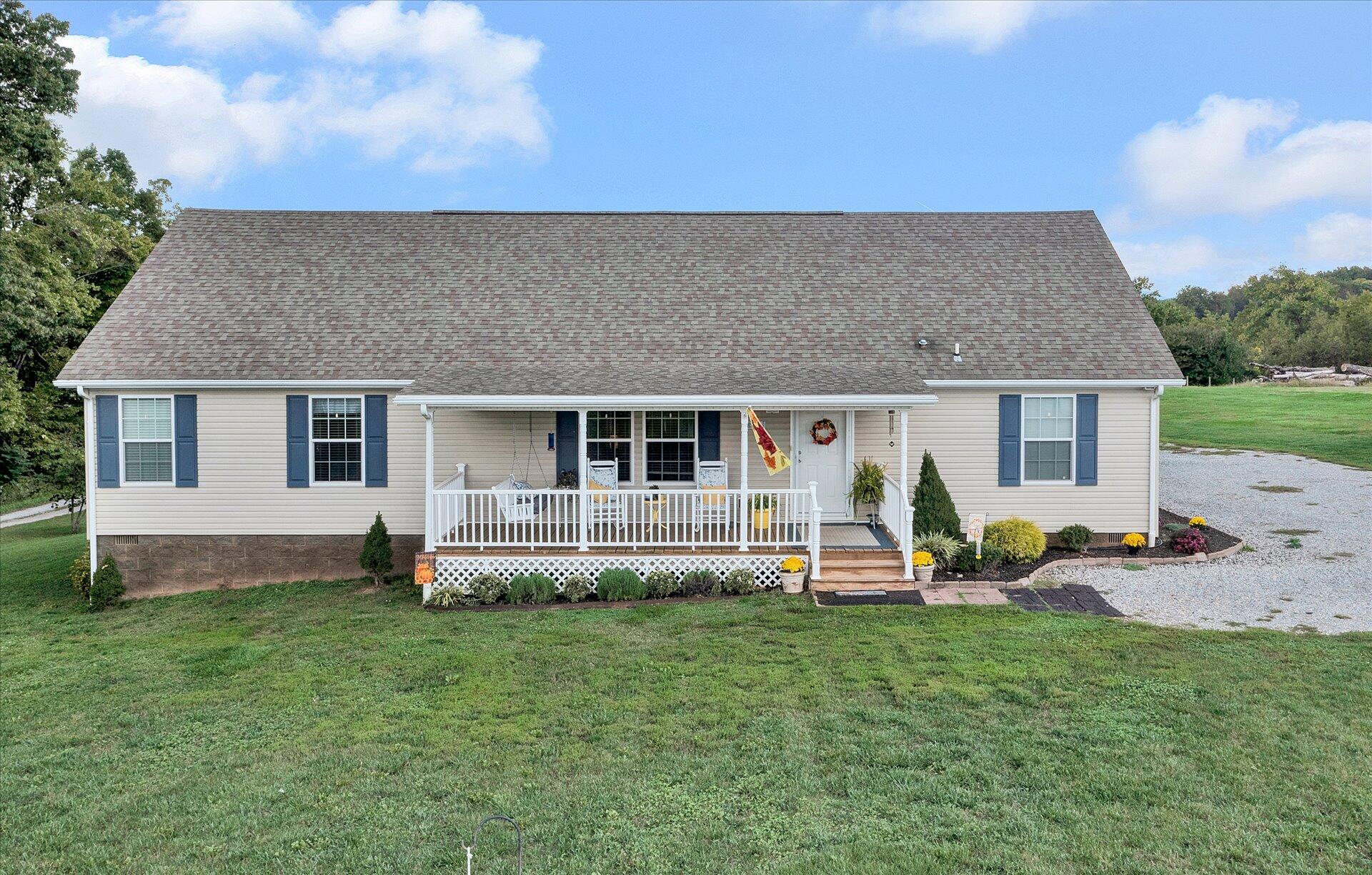 2220 Callaway Road Rocky Mount, VA 24151 - Photo 3 of 22 a front view of house with yard and outdoor seating