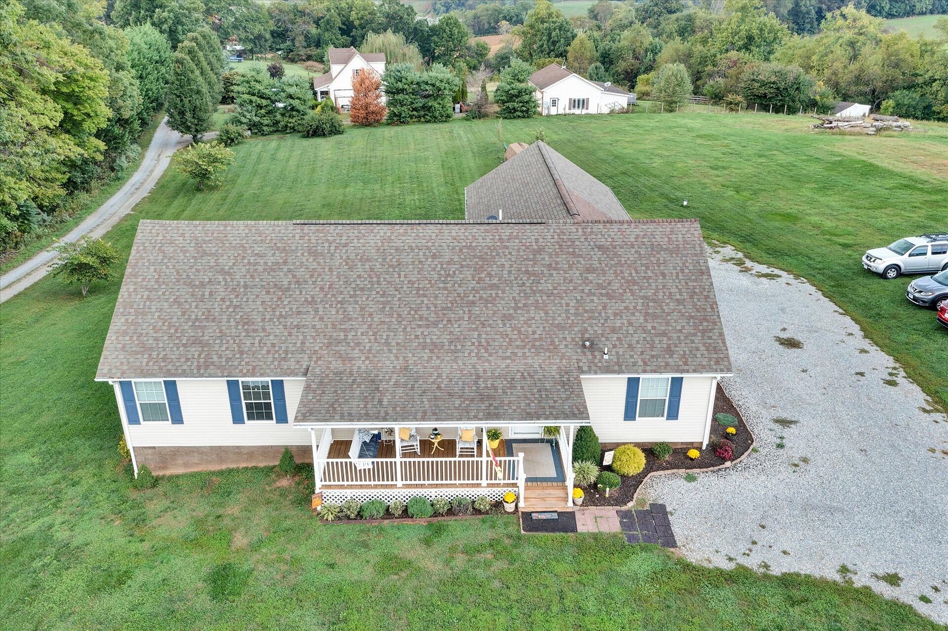 2220 Callaway Road Rocky Mount, VA 24151 - Photo 21 of 22 an aerial view of a house with swimming pool garden and patio