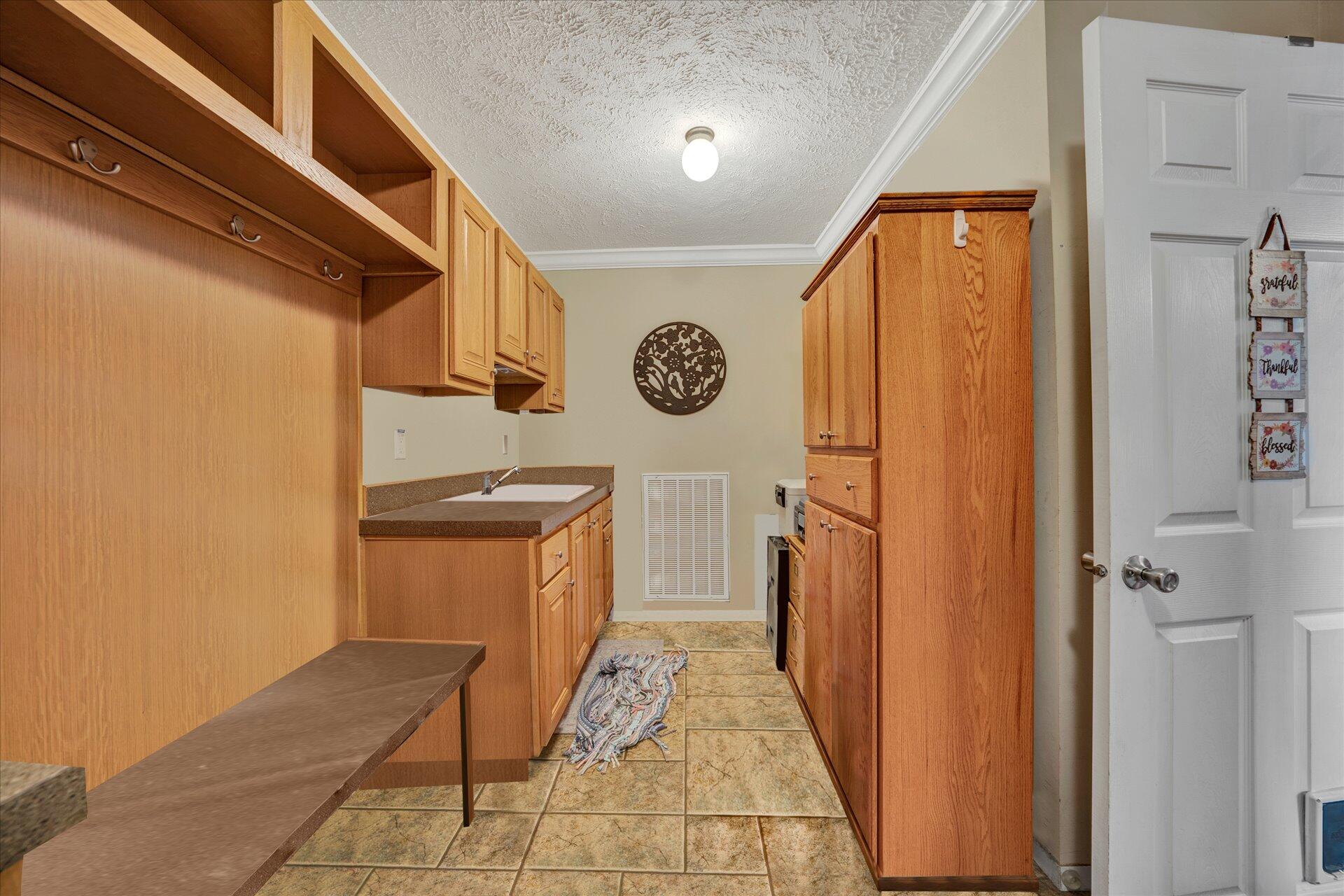 2220 Callaway Road Rocky Mount, VA 24151 - Photo 9 of 22 a utility room with a refrigerator and washer