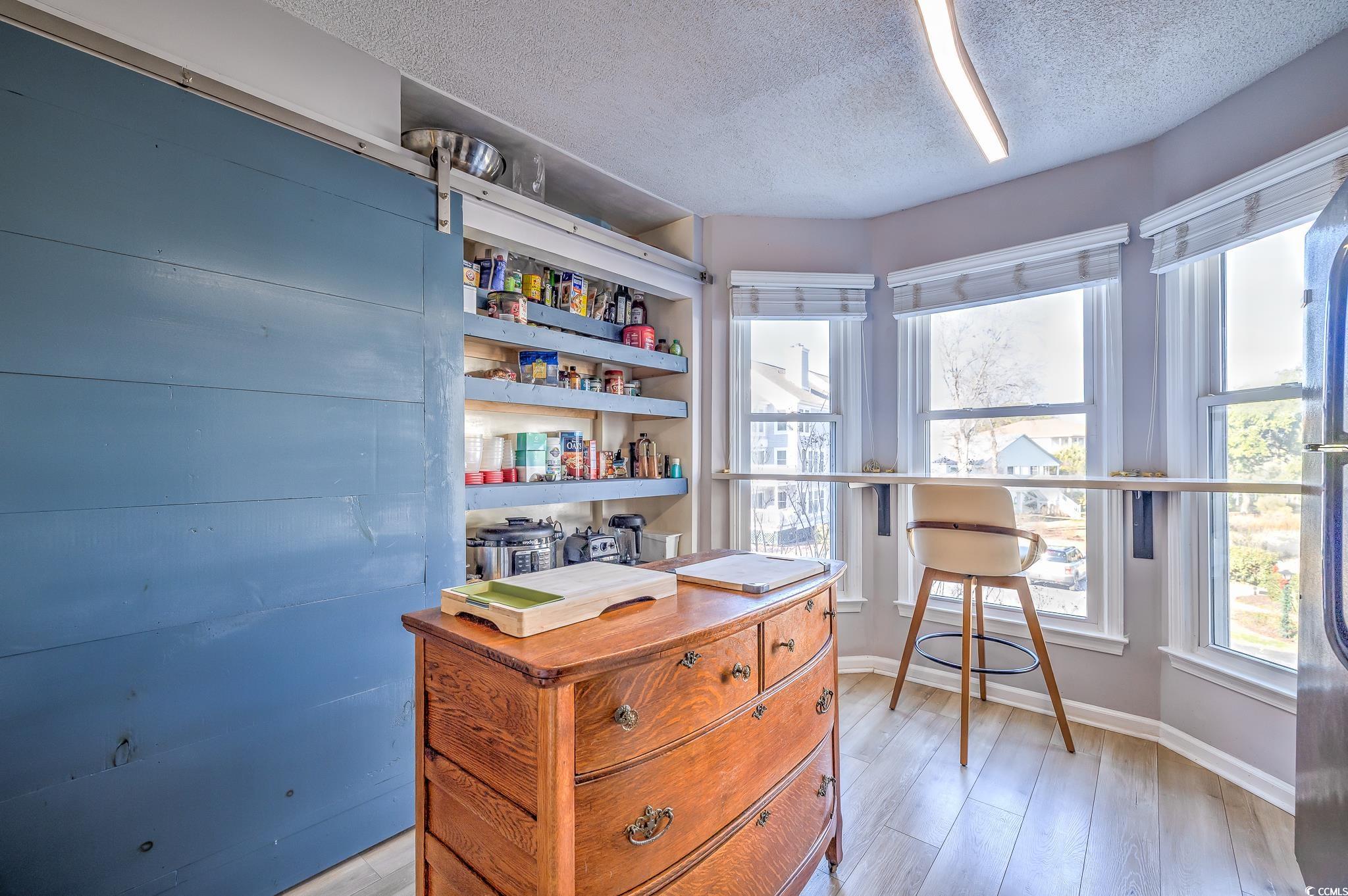 4999 Highway 17 Business, Unit 305 Murrells Inlet, SC 29576 - Photo 8 of 27 Office space with a textured ceiling and light wood-type flooring